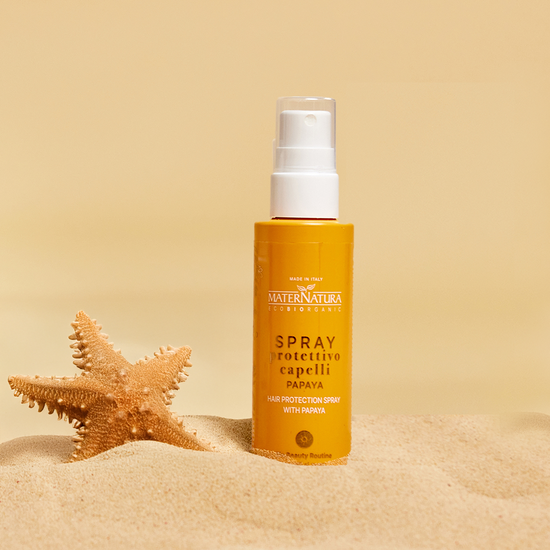 Repairing hair spray with mango and papaya sun