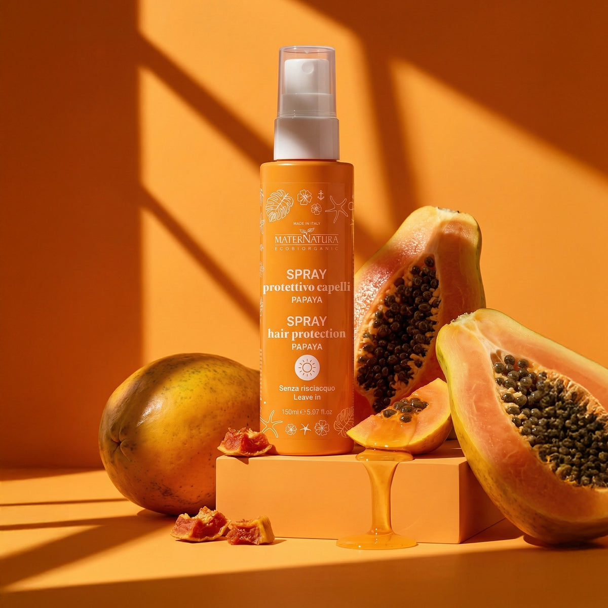 Repairing hair spray with mango and papaya sun