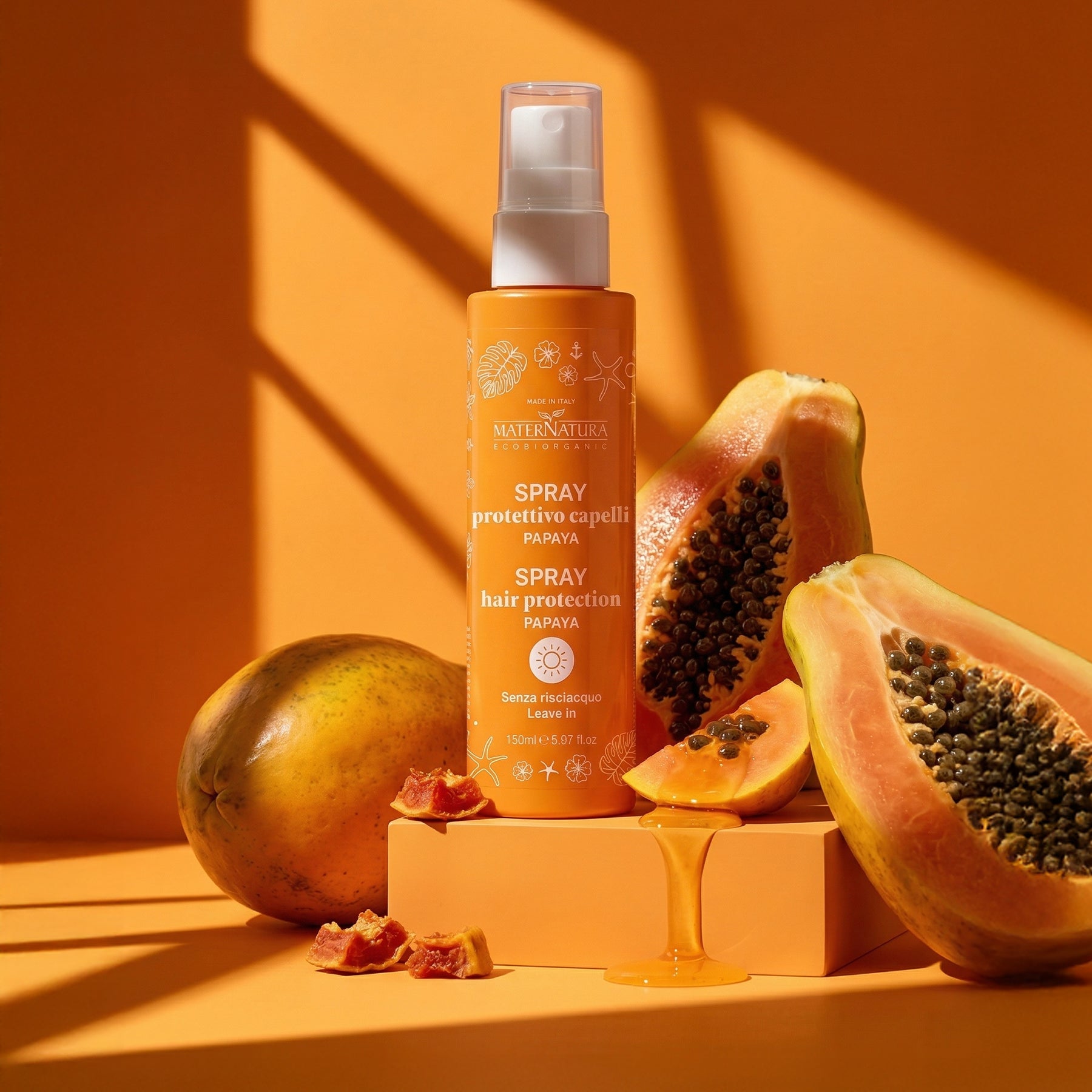 Repairing hair spray with mango and papaya sun